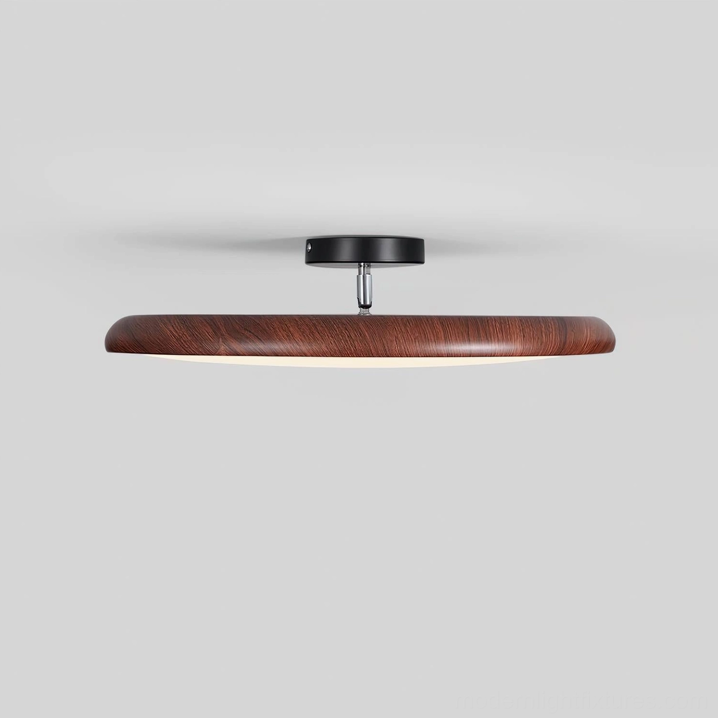 Ellos LED ceiling light providing even illumination across full fixture face