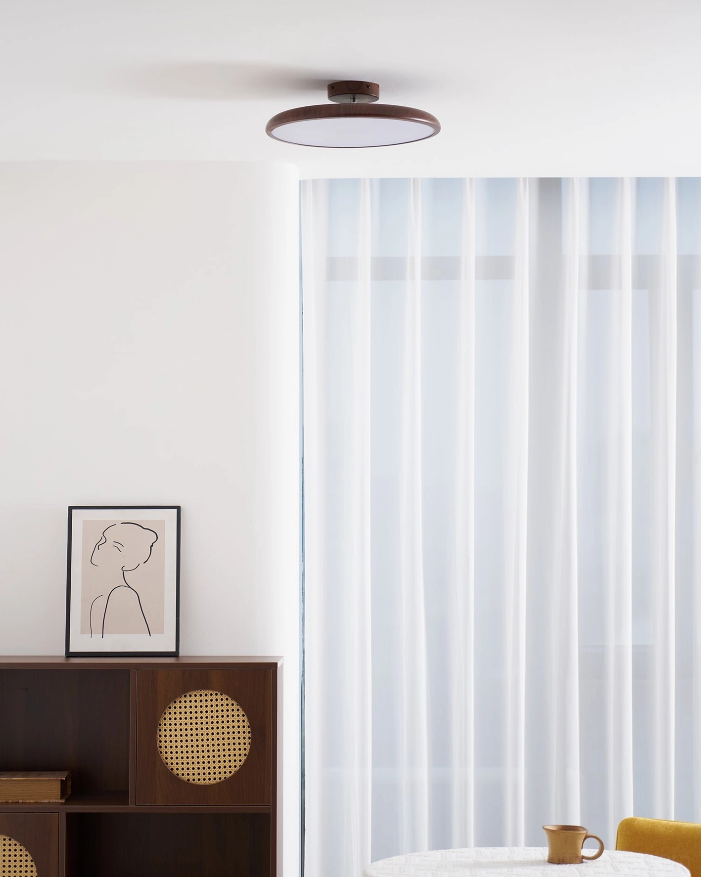 Ellos modern flush mount ceiling light in minimalist dining room interior