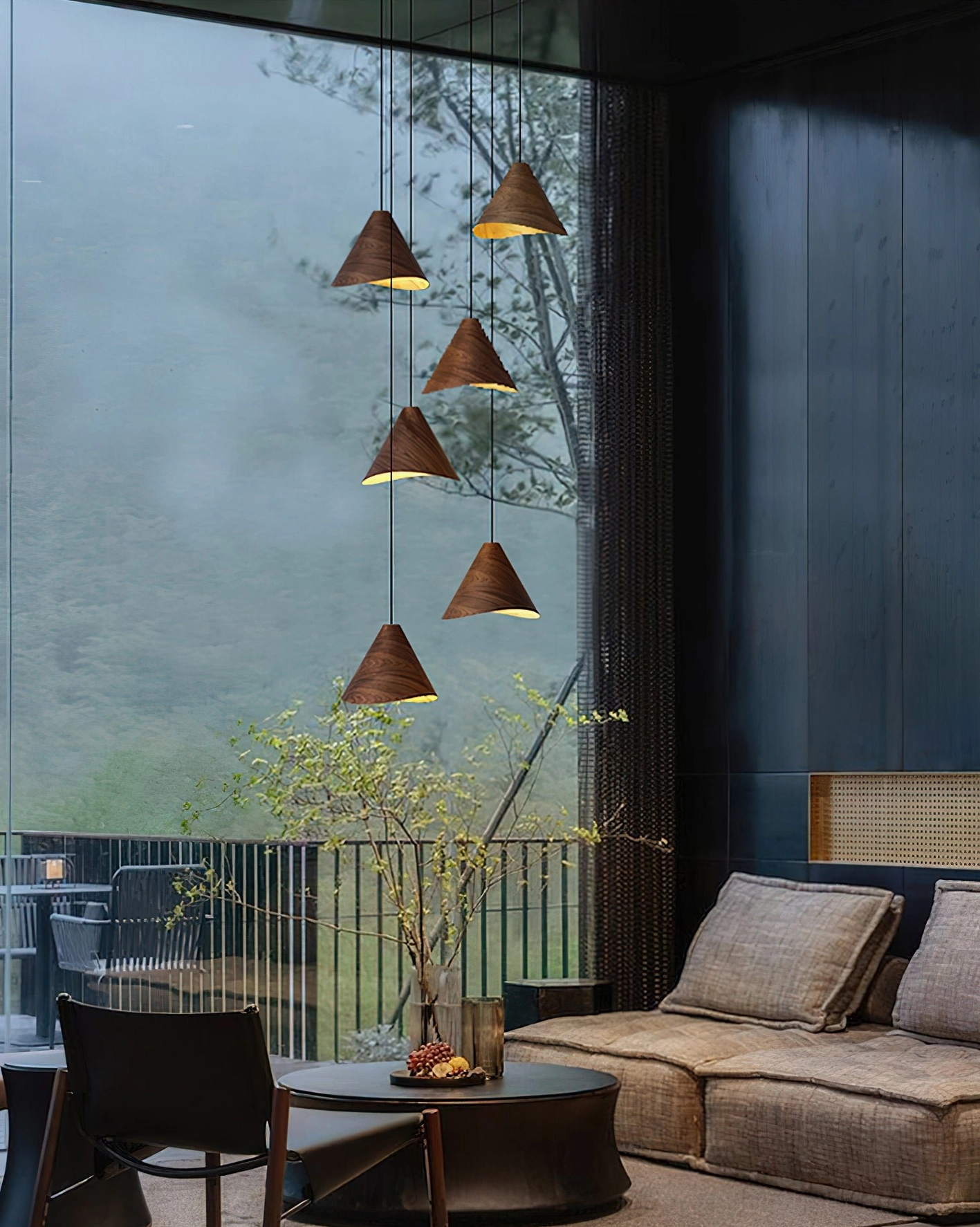 Six-head cascading wooden cone pendant lights in brown walnut finish above wabi-sabi modern living room