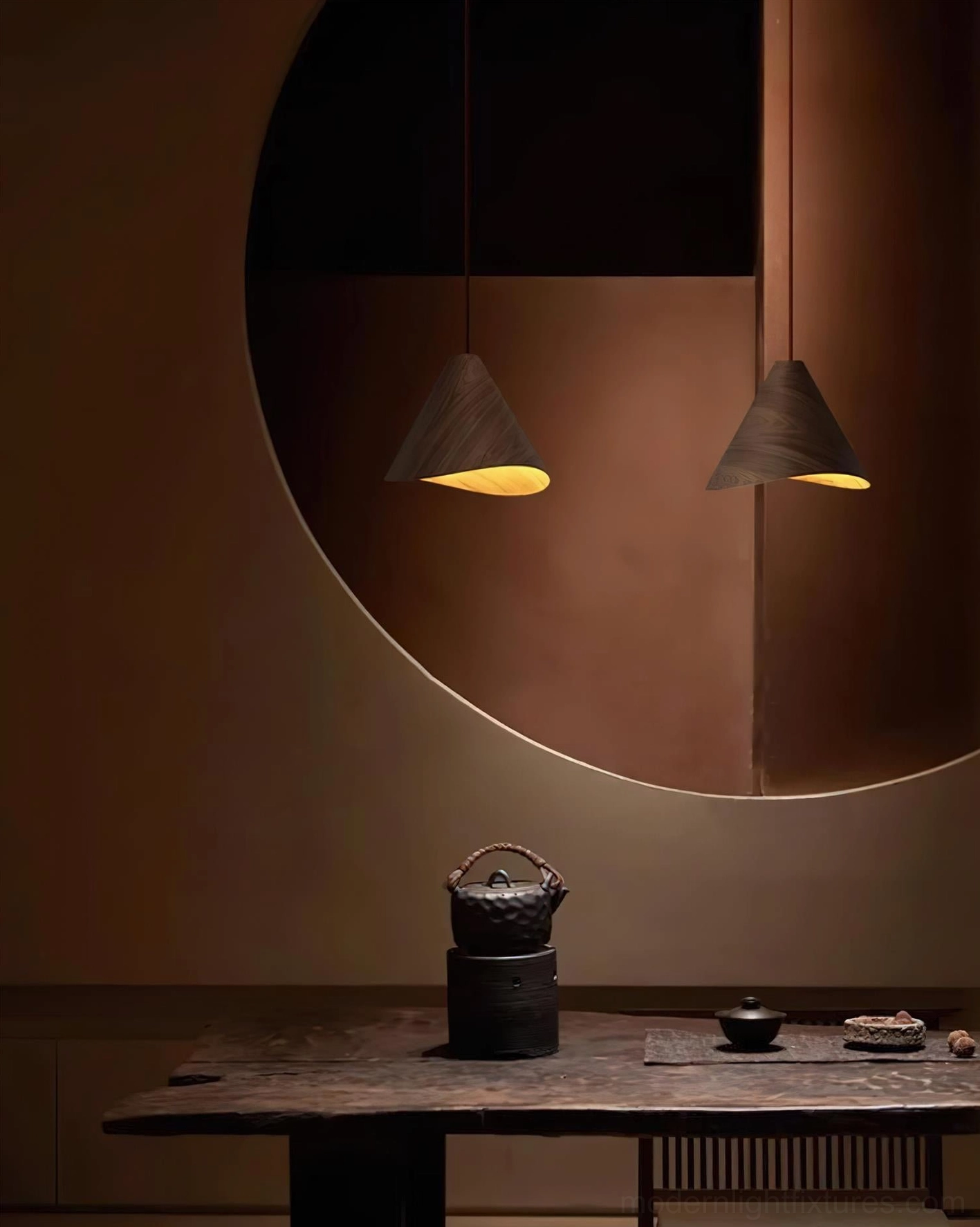 Multiple Elmira wooden cone pendant lights installed as cluster above modern minimalist dining table