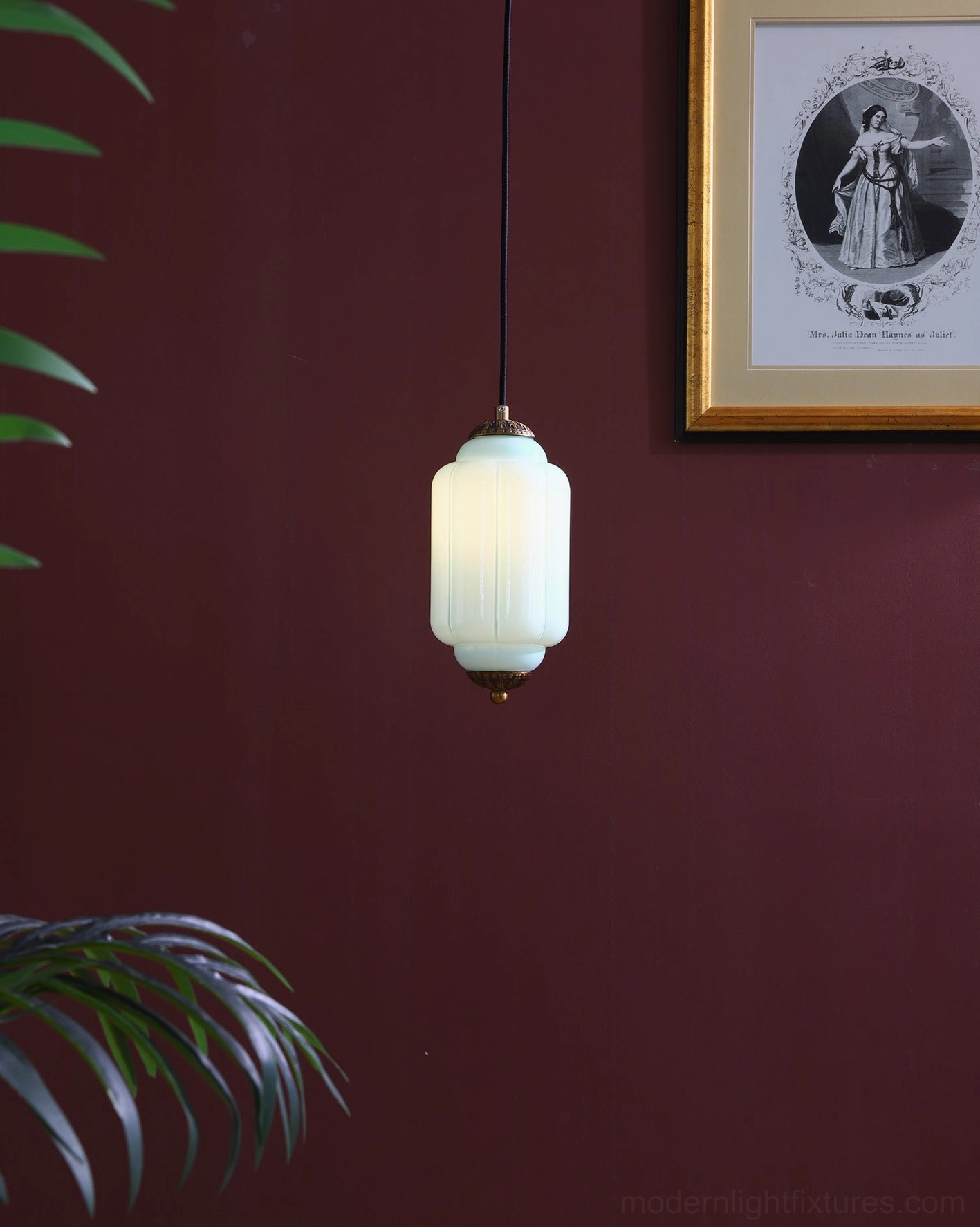 Glass lantern pendant lamp soft jewel tones sophisticated design aesthetic