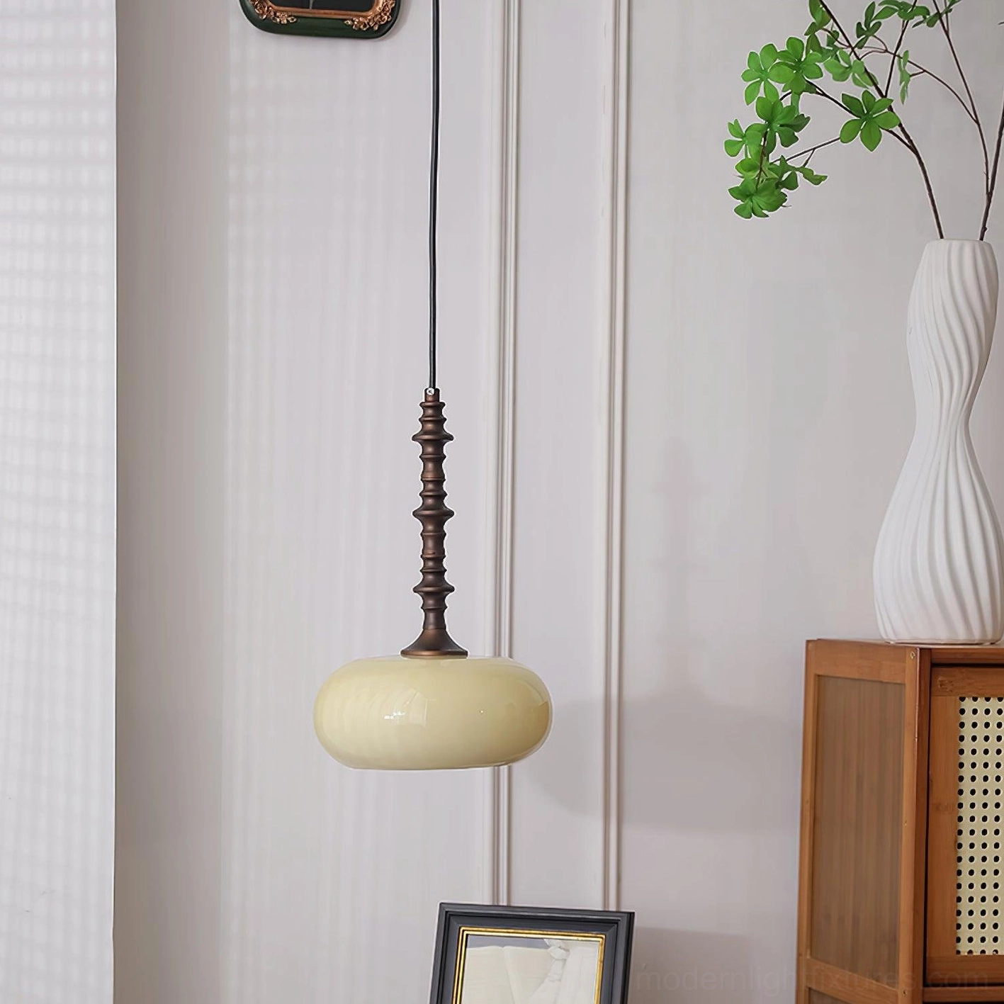 Close-up of Eloise pendant light showing texture and craftsmanship of frosted white glass shade