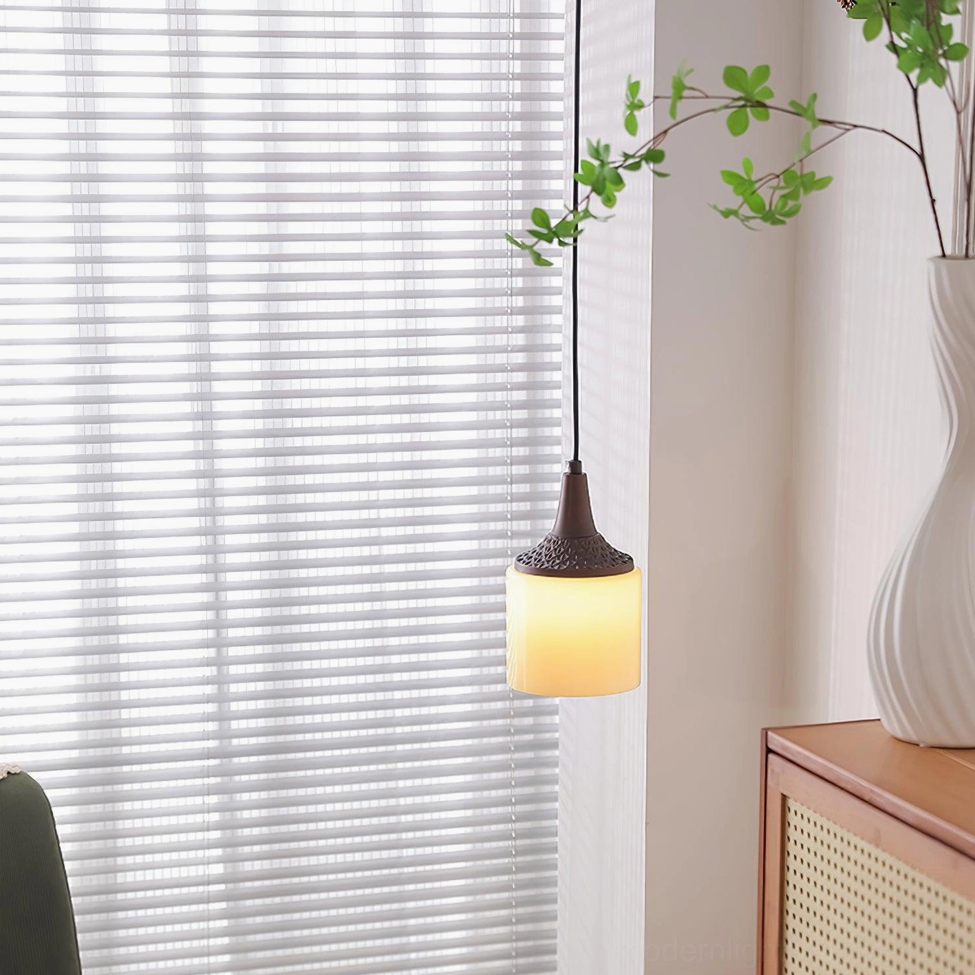 Cylindrical frosted white glass shade pendant light with conical dark brown metal cap detail