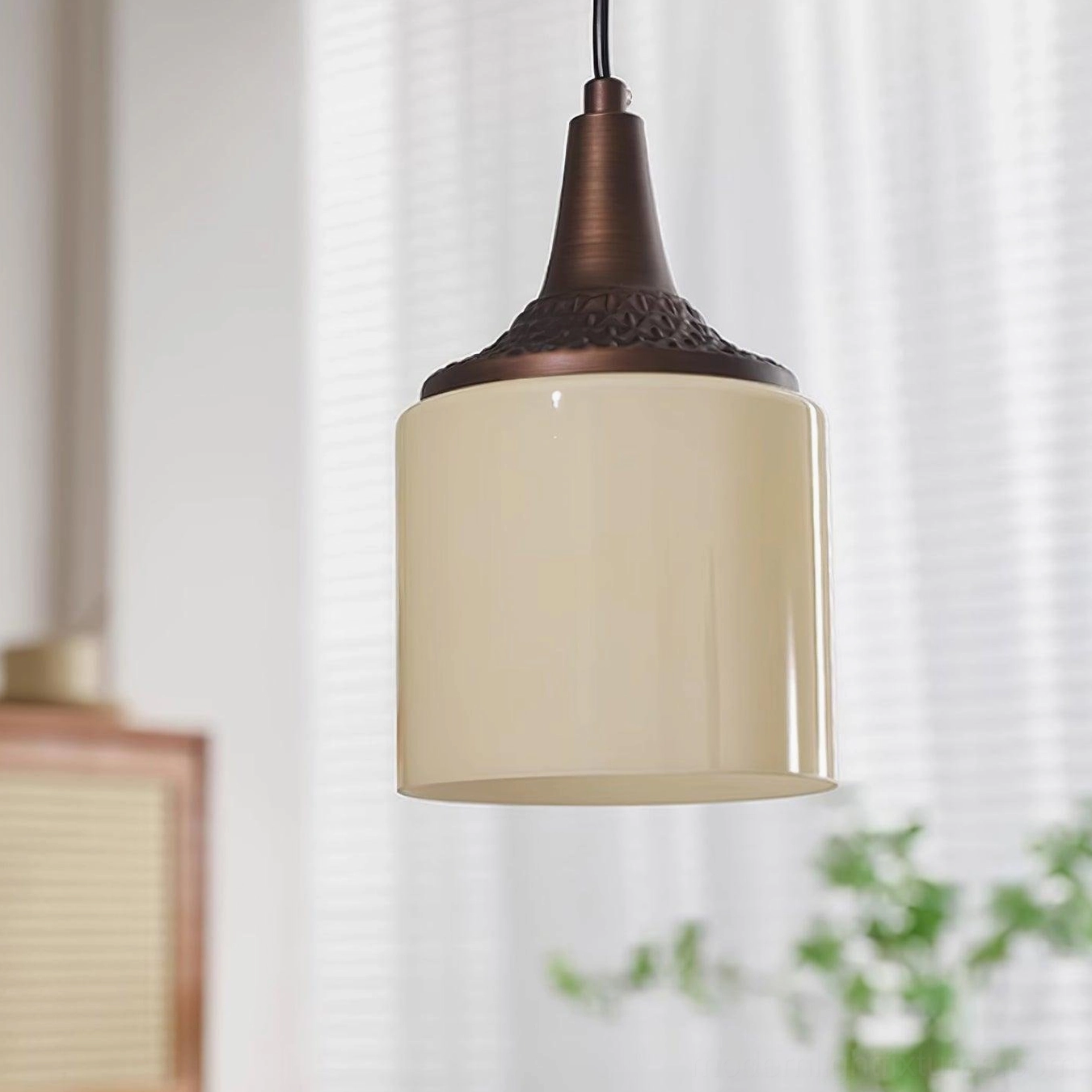 Eloise vintage pendant light installation in contemporary dining room above table setting