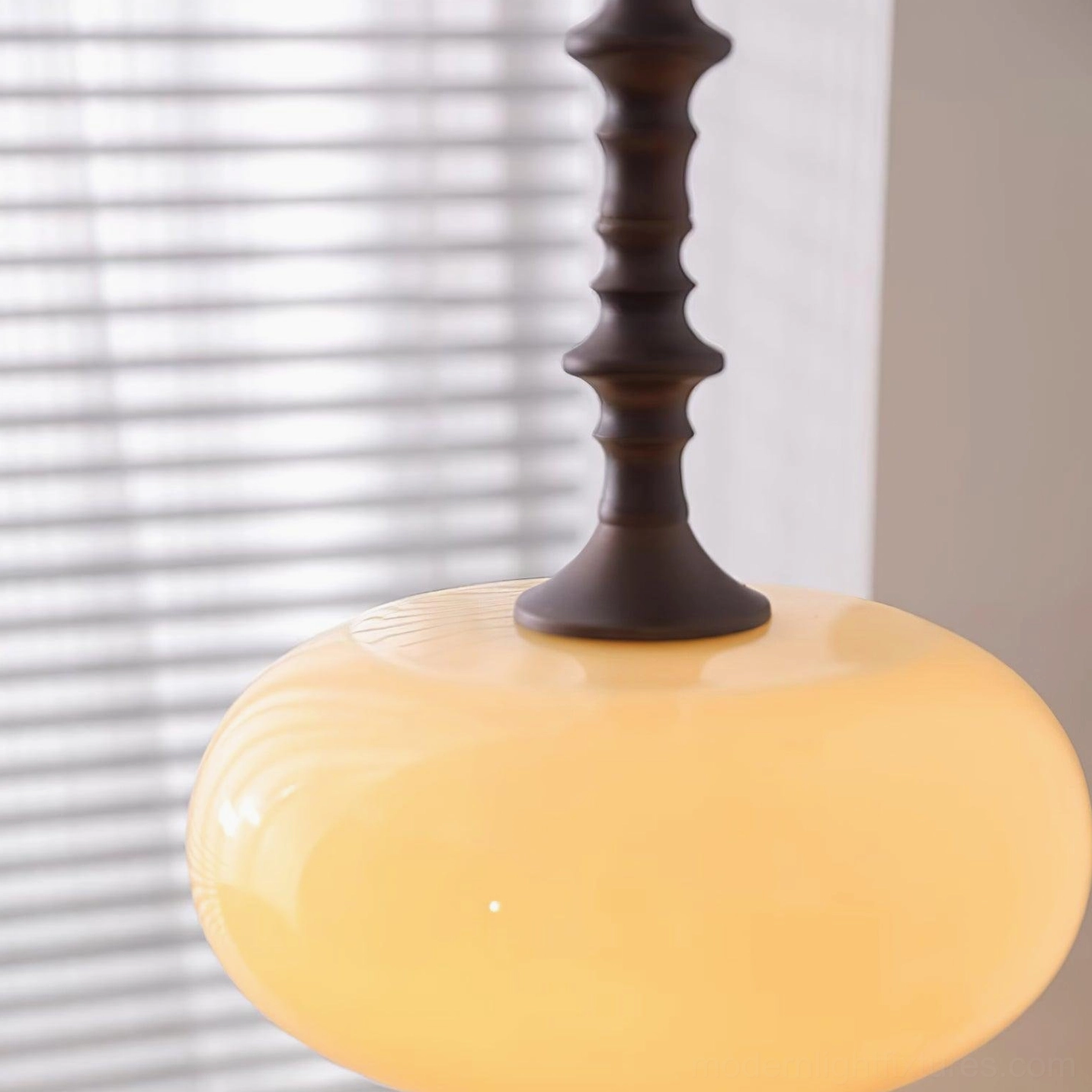Eloise vintage inspired pendant light creating soft illumination in stylish interior setting