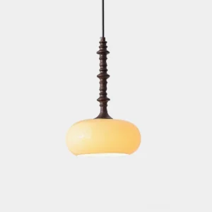 Eloise vintage pendant light with dark brown twisted metal stem and frosted white glass shade, front studio view