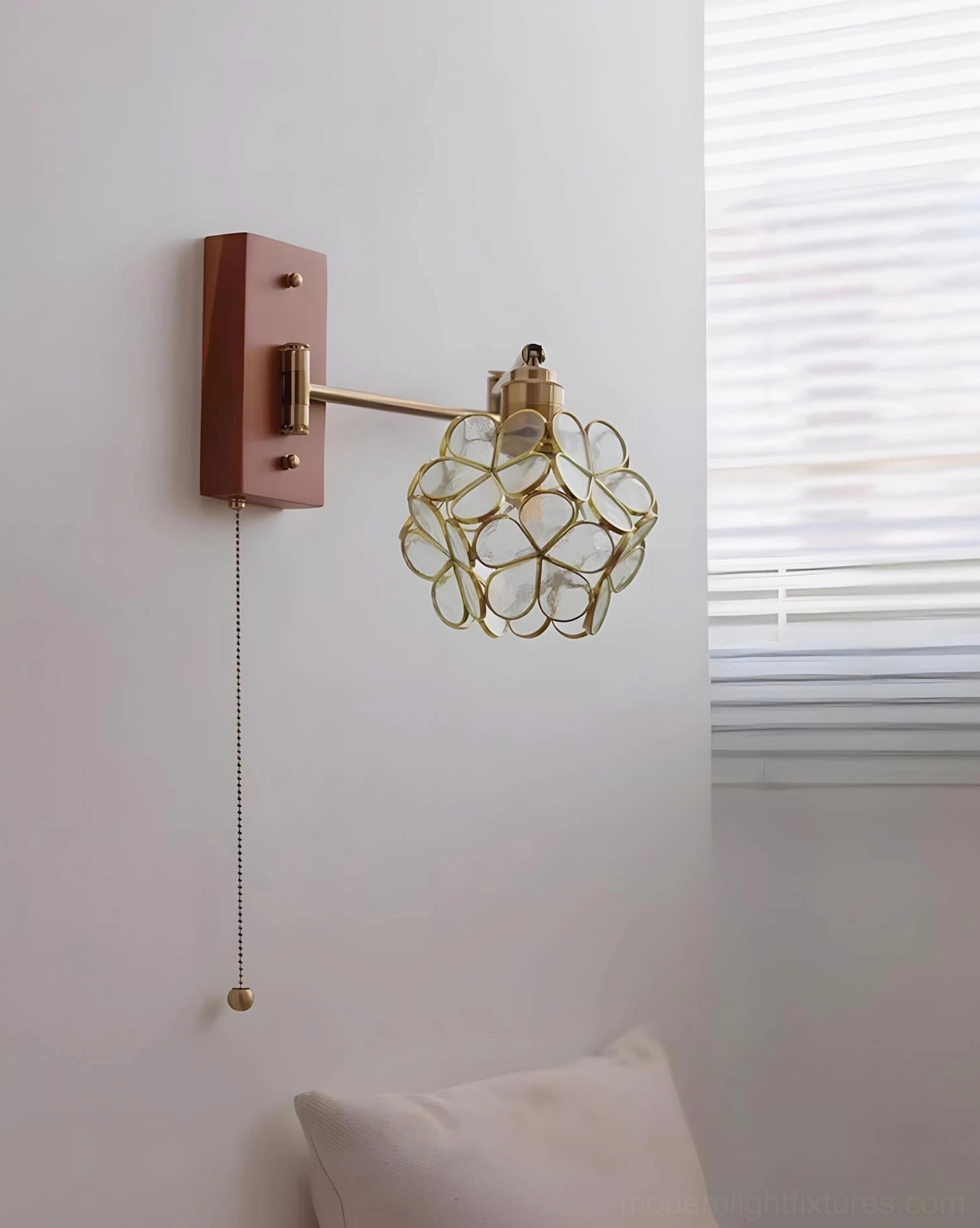 Elowen botanical wall sconce craftsmanship detail, metal body glass petal shade construction showing quality materials and artistic finish