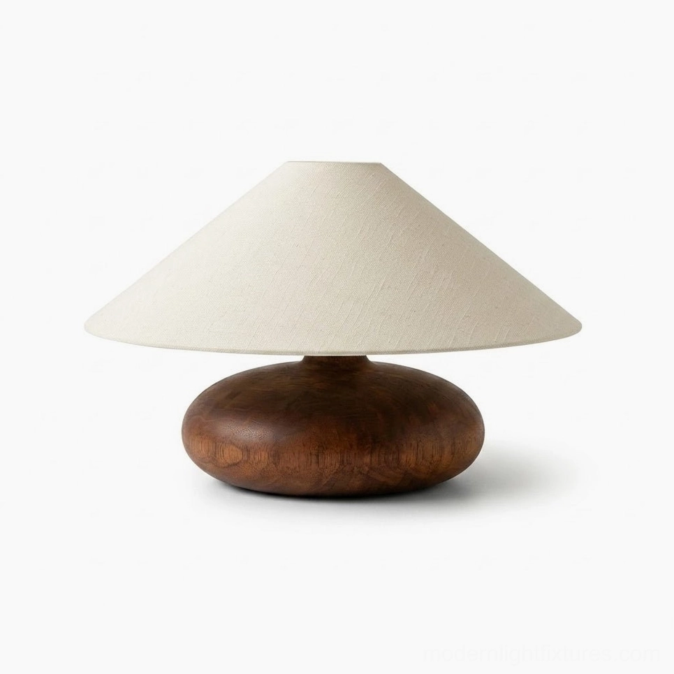 Elowen walnut pebble base table lamp with ivory linen shade, front view studio photography