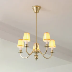 Elviera 5-head golden brass chandelier with warm yellow glass shades installed on residential ceiling