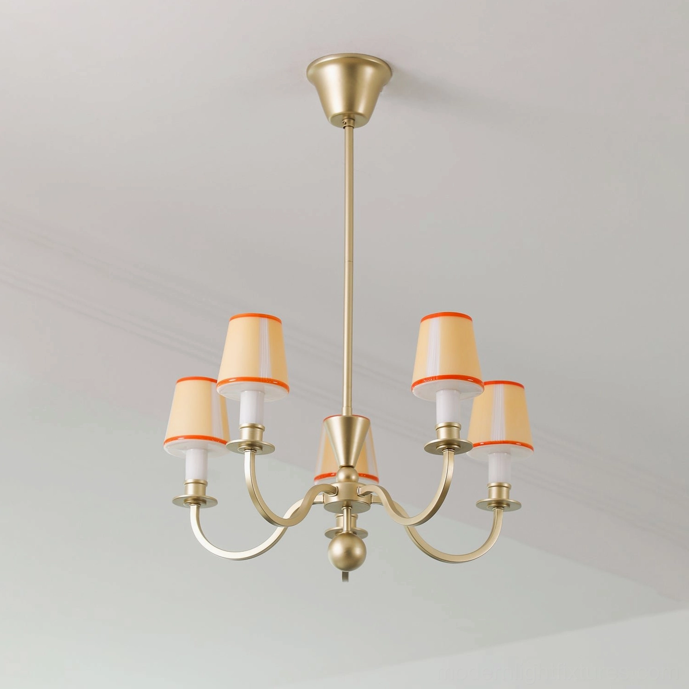 Elviera vintage brass multi-light chandelier with curved golden arms and orange-trimmed shades, studio view