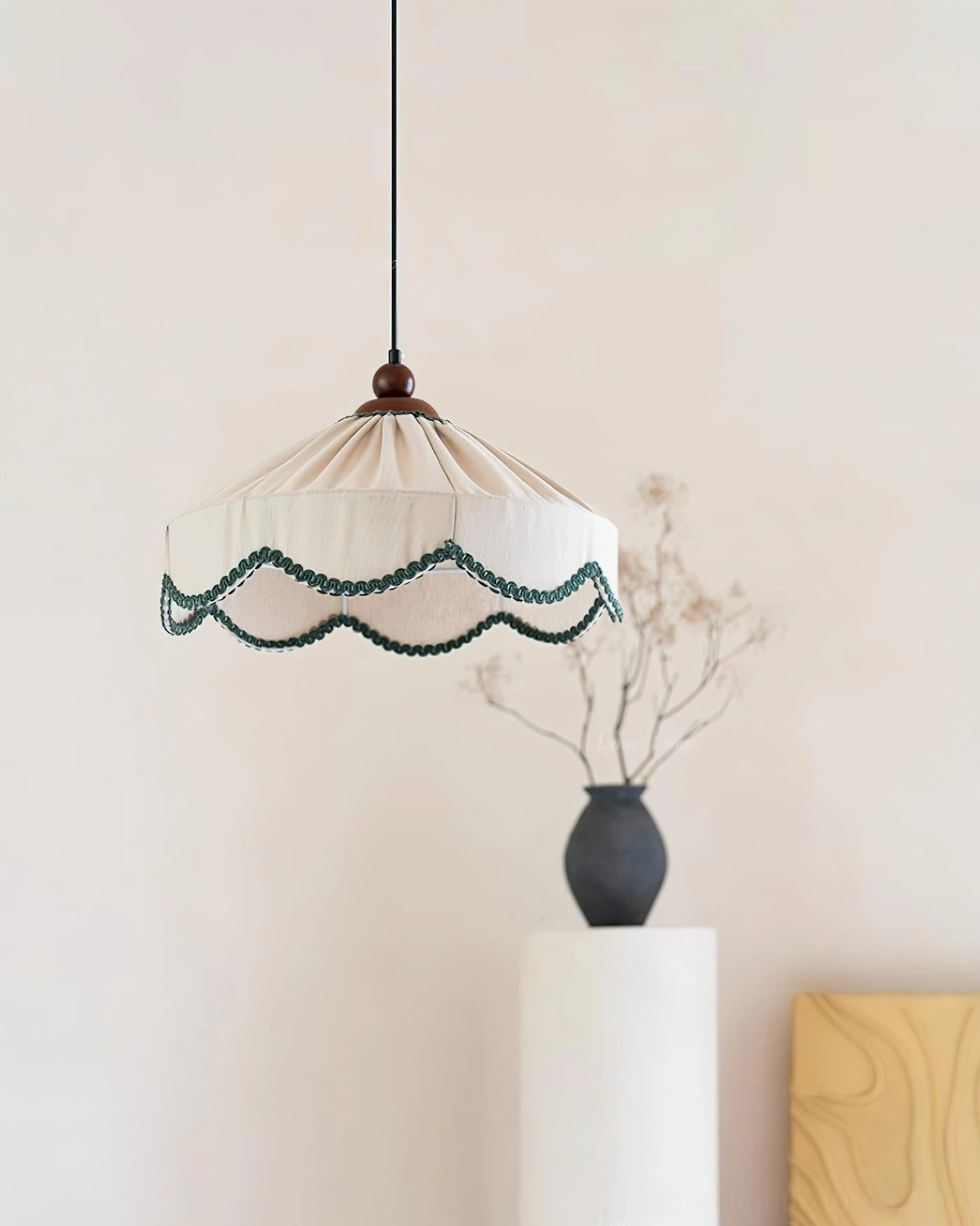Elysia fabric pendant lamp left profile view with visible scalloped green trim and fabric pleats
