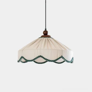 Elysia pleated fabric pendant lamp with green scalloped trim, front view on white background