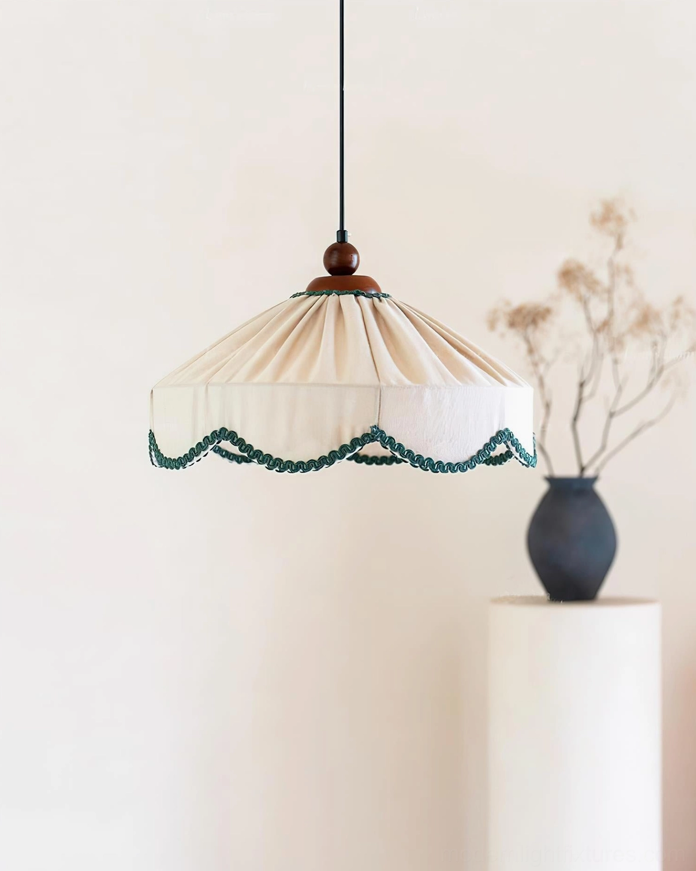 Elysia pendant lamp right side view highlighting pleated beige fabric shade with walnut hardware