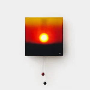 Ember Glow square wall sconce with black frame and red-amber sunset gradient panel, front view against white background