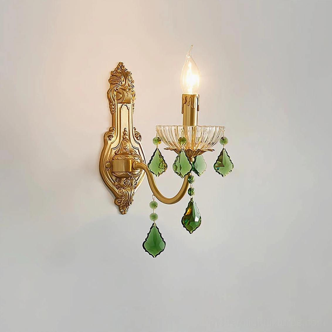 Emerald green crystal brass wall sconce with dual candle lights and ornate baroque detailing