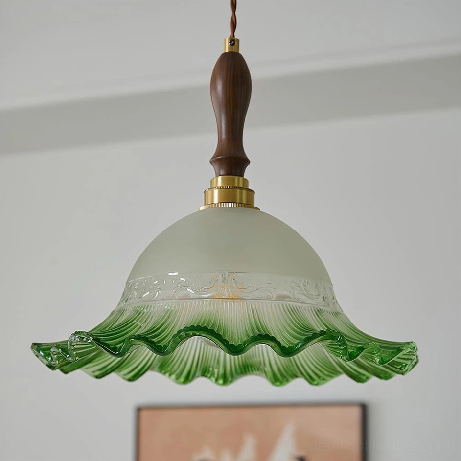 Emerald green frosted glass pendant light showing embossed pattern and ruffled edge
