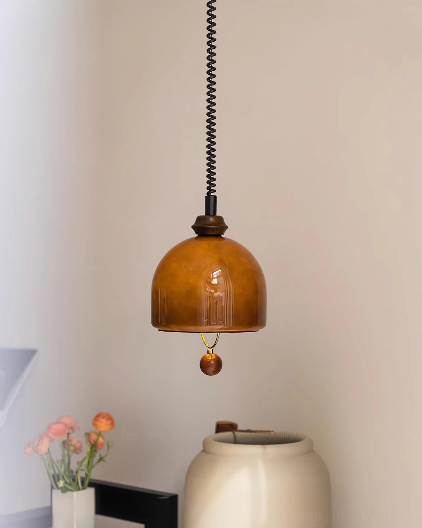 Enda mid-century modern pendant light in black and coffee finish showing versatile color options