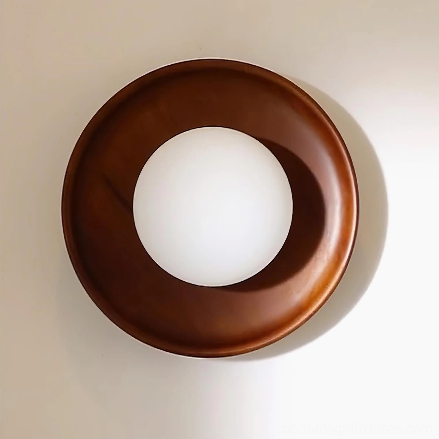 Energy efficient round wall sconce with LED bulb compatibility showcase
