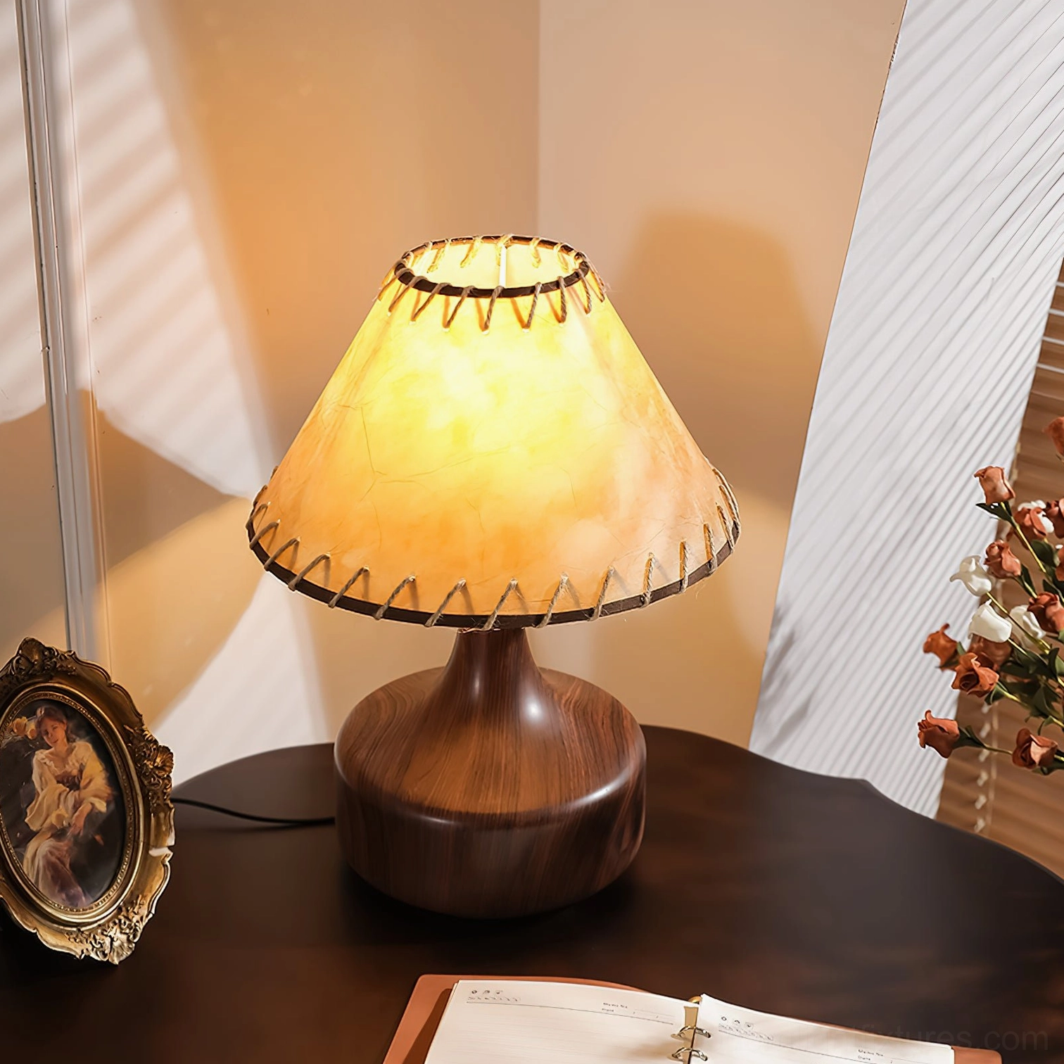 Enora table lamp with stitched parchment shade detail and walnut base