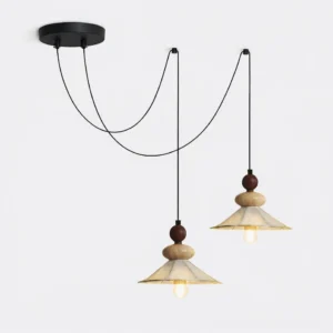 Equinox Displacement modern pendant light with sculptural wood accents and pleated linen fabric shade, front studio view