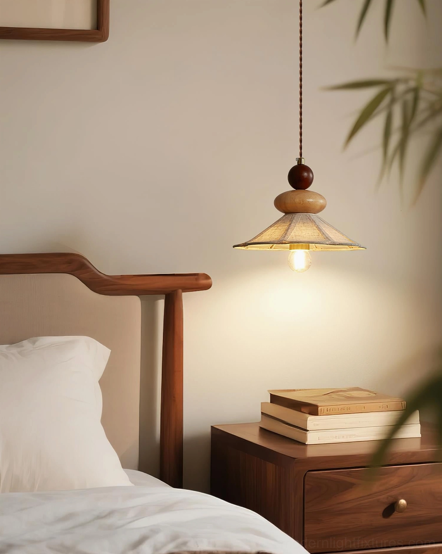 Single wooden pendant light in cozy bedroom above walnut nightstand, neutral rustic design creating warm bedside ambiance