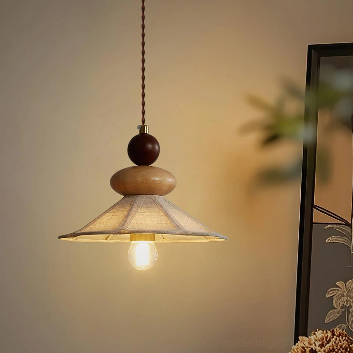 Equinox wooden pendant lamp in vintage home corner with flared linen shade and dark wood top bead, warm exposed bulb