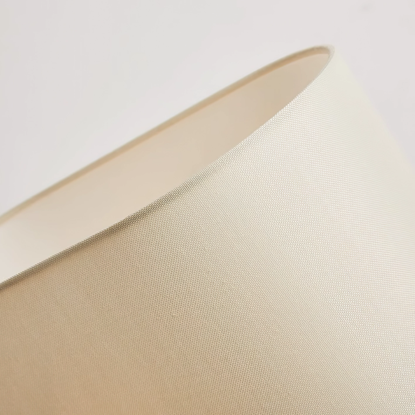 Close-up detail of Esla lamp fabric shade texture, woven textile off-white linen material