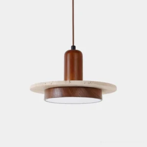 Ethereal modern pendant light with travertine stone disc and wood accent, warm white 3000K LED illumination, low-angle studio view