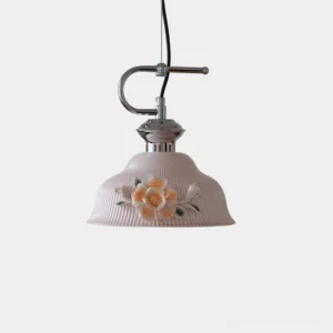 Evelisse ceramic pendant light with sculptured camellia bloom in blush pink, featuring polished chrome hardware and 3D floral decoration against white studio background