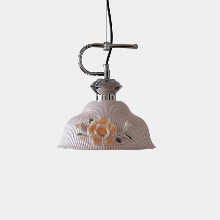 Evelisse ceramic pendant light with sculptured camellia bloom in blush pink, featuring polished chrome hardware and 3D floral decoration against white studio background