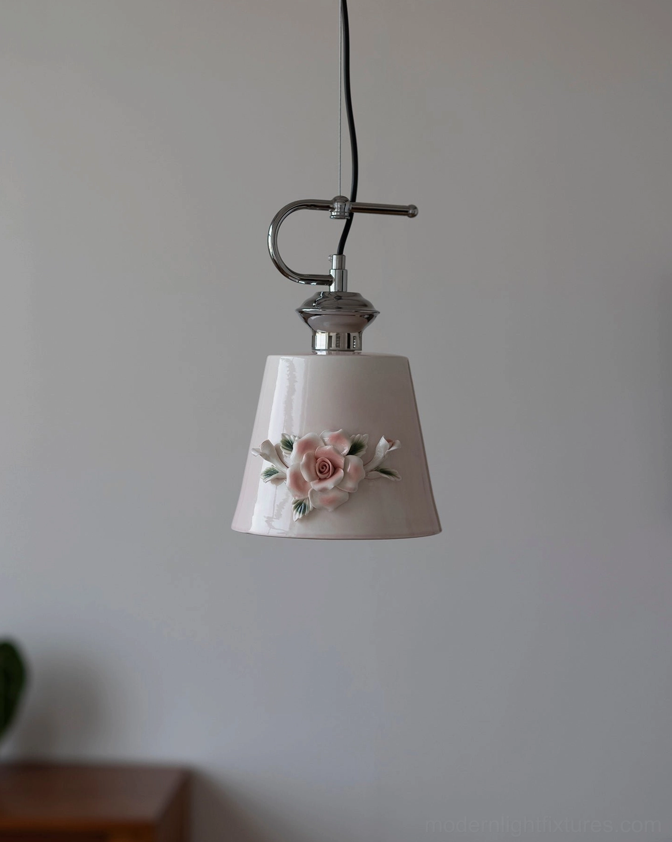 Evelisse blush pink ceramic pendant light Model B in tall tapered configuration with hand-sculpted camellia element