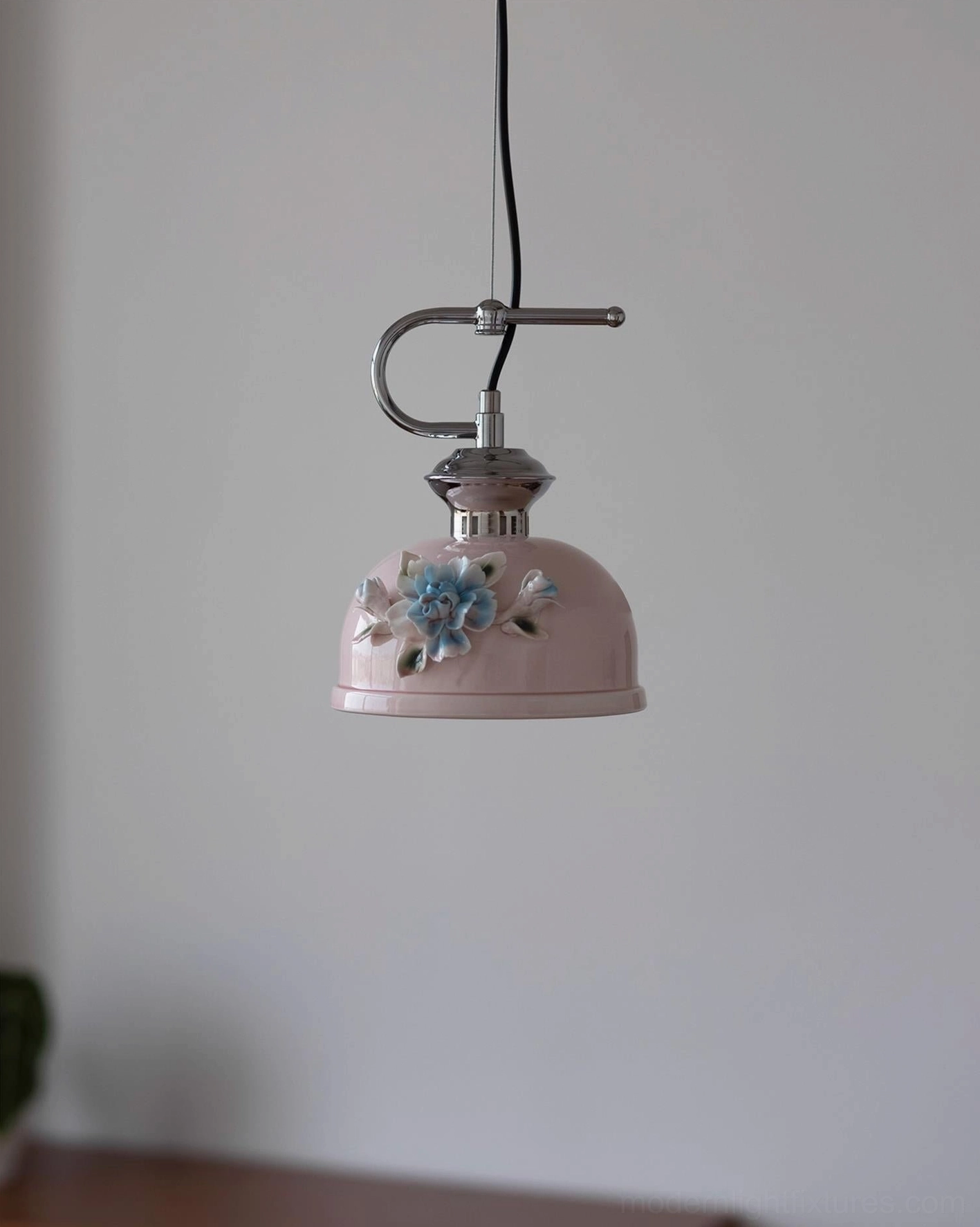 Evelisse ceramic pendant fixture installation detail with chrome suspension hardware and wire connection points