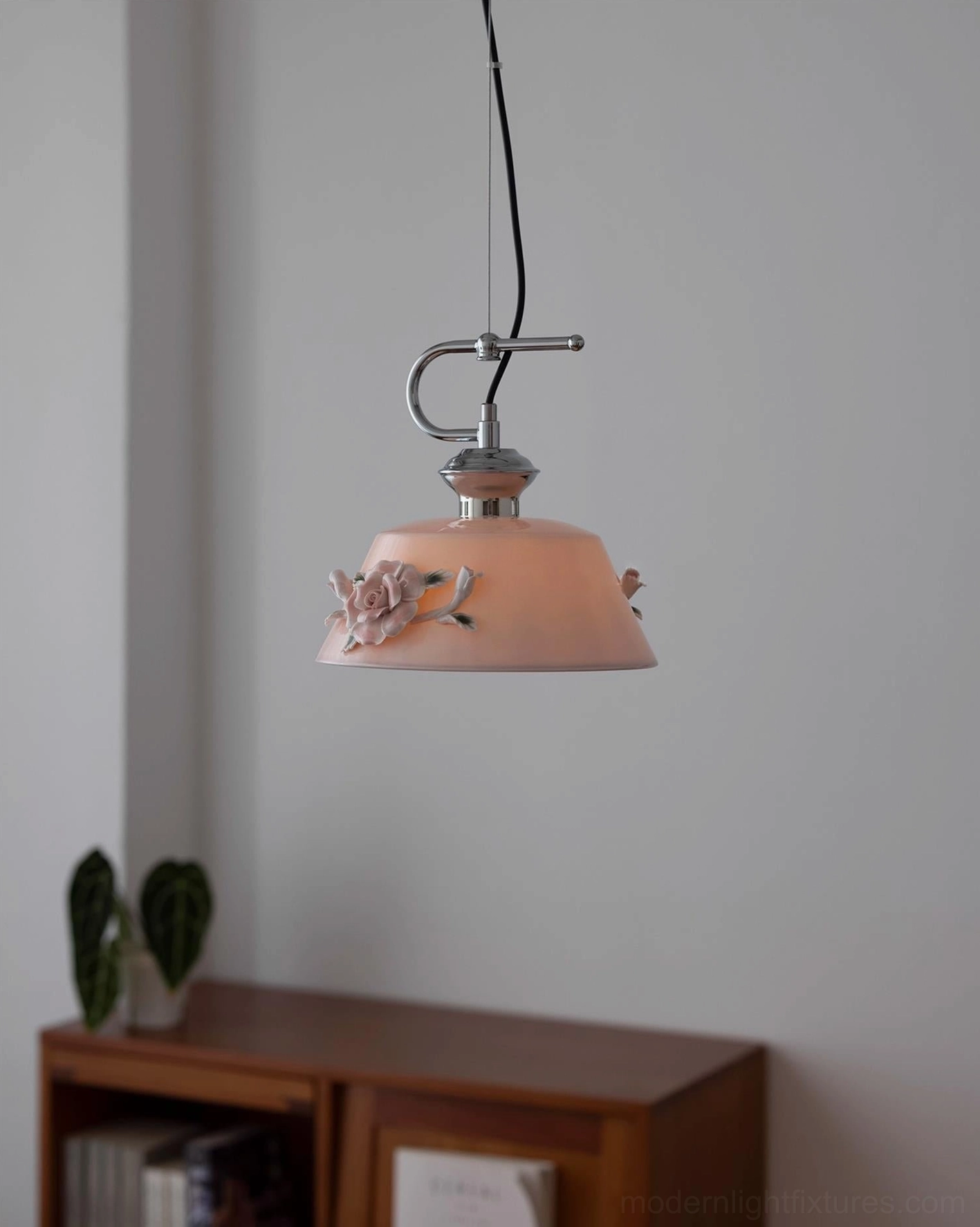 Evelisse blush pink ceramic pendant fixture with hand-applied floral decoration and polished metal suspension components