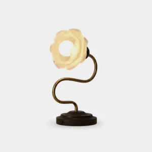 Everbud floral table lamp with brass curved stem and frosted glass shade on white background
