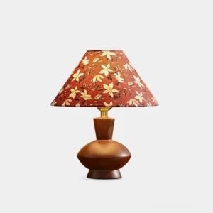 Evie wooden table lamp with red floral fabric shade and brown walnut wood base - modern table lighting fixture on white background