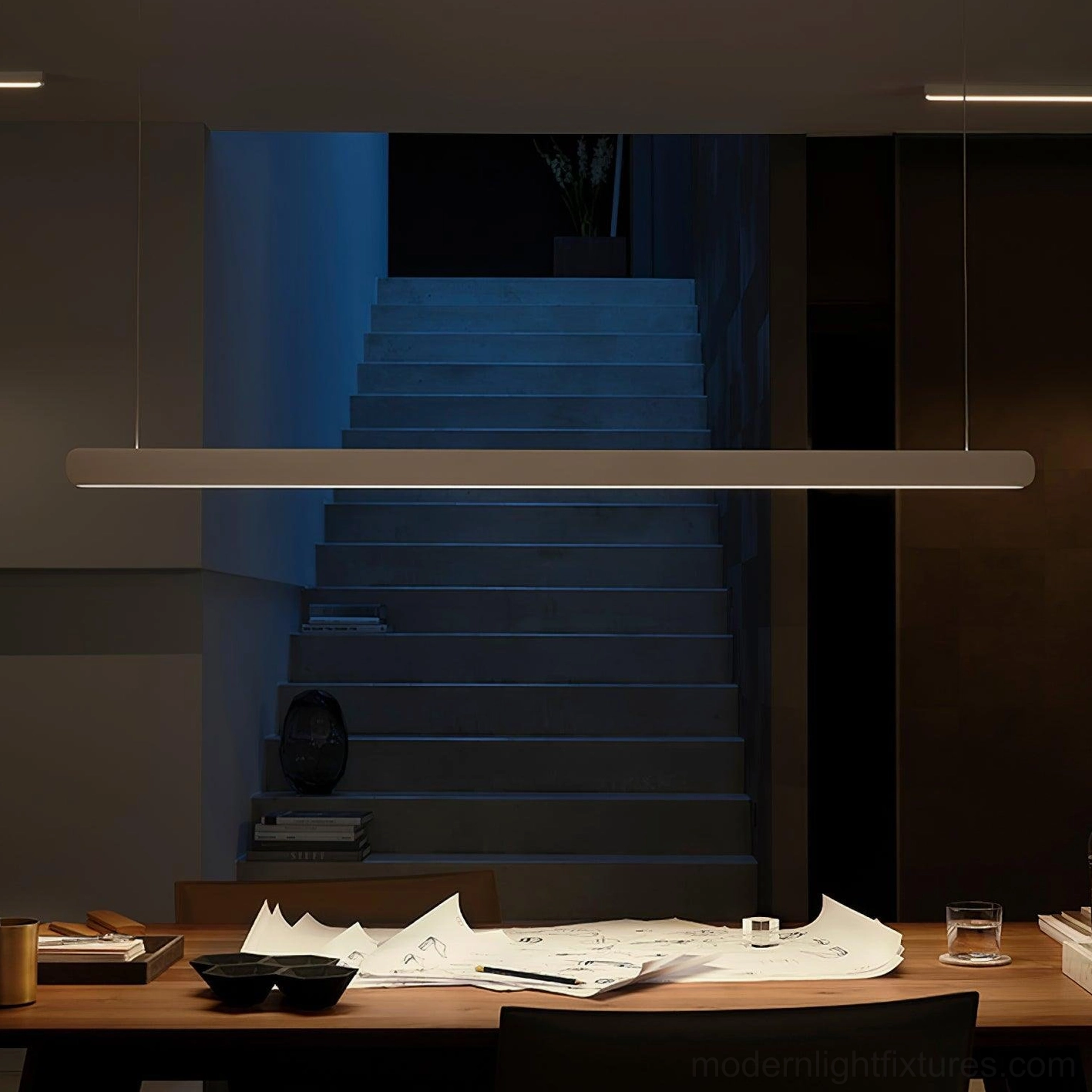 Extended 136cm linear pendant lamp in champagne gold finish architectural detail