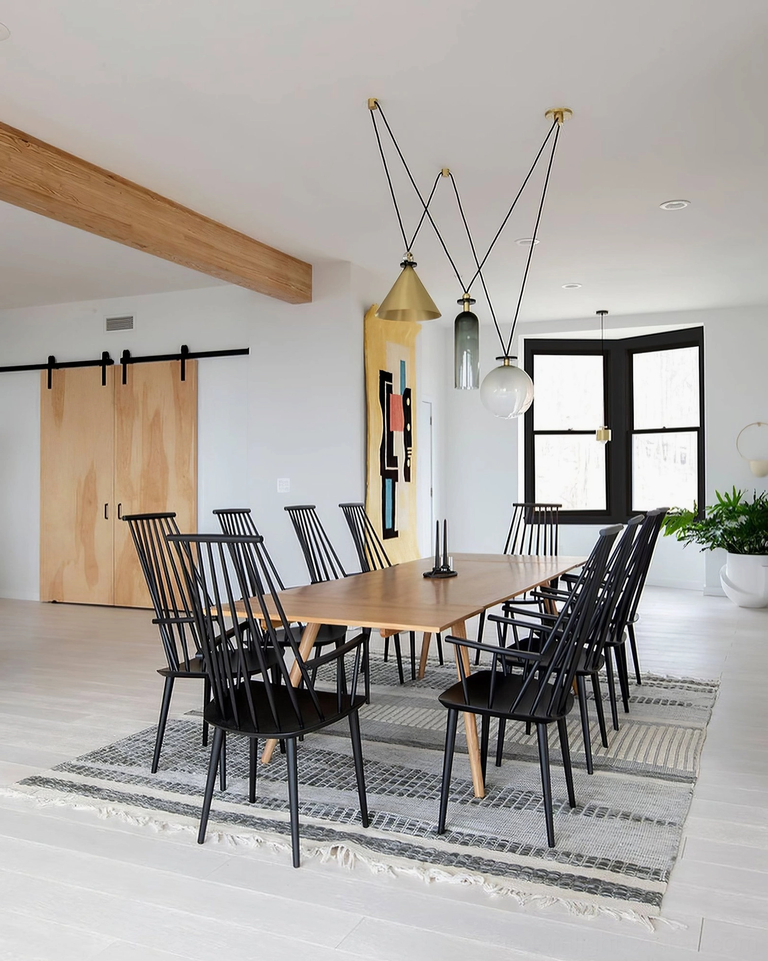 Extra-tall geometric pendant chandelier model I creating architectural statement fixture modern commercial space
