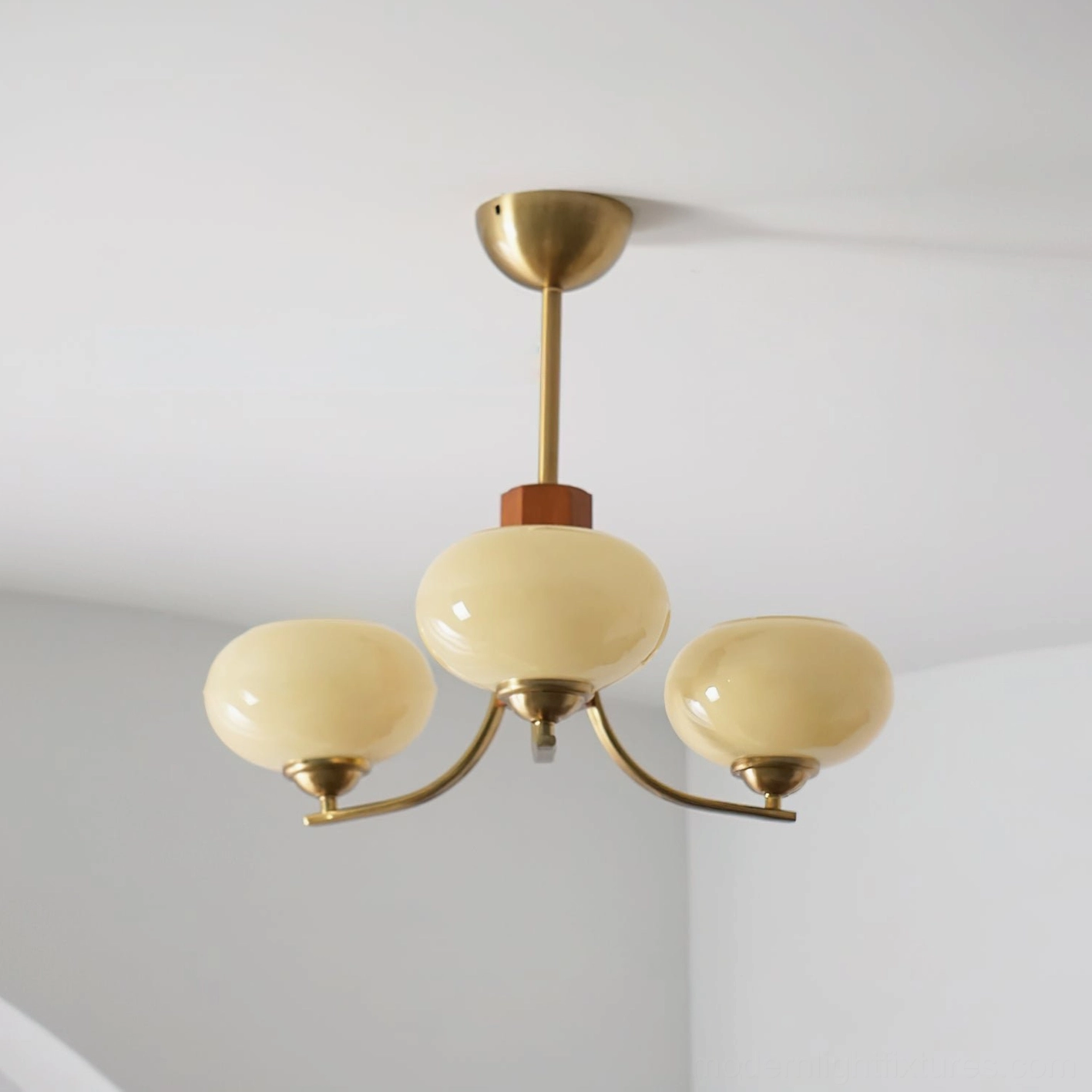 Fabio 3-head chandelier copper and beige color variant front view studio shot