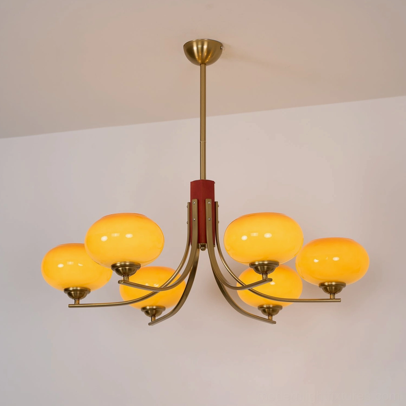 Fabio chandelier dining table overhead installation creating elegant formal dining ambiance