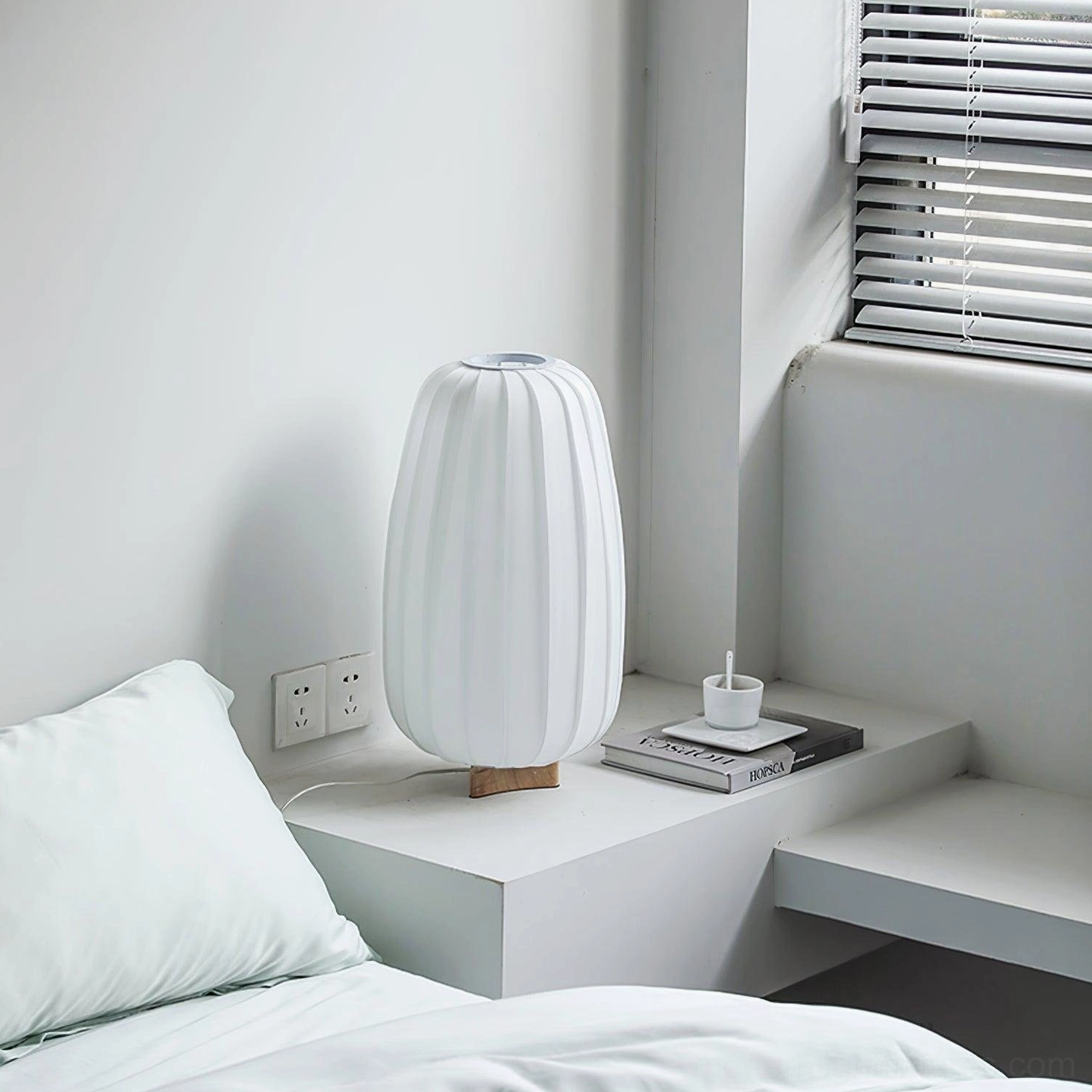 Fabric table lamp minimalist wooden base crafted lighting fixture detail