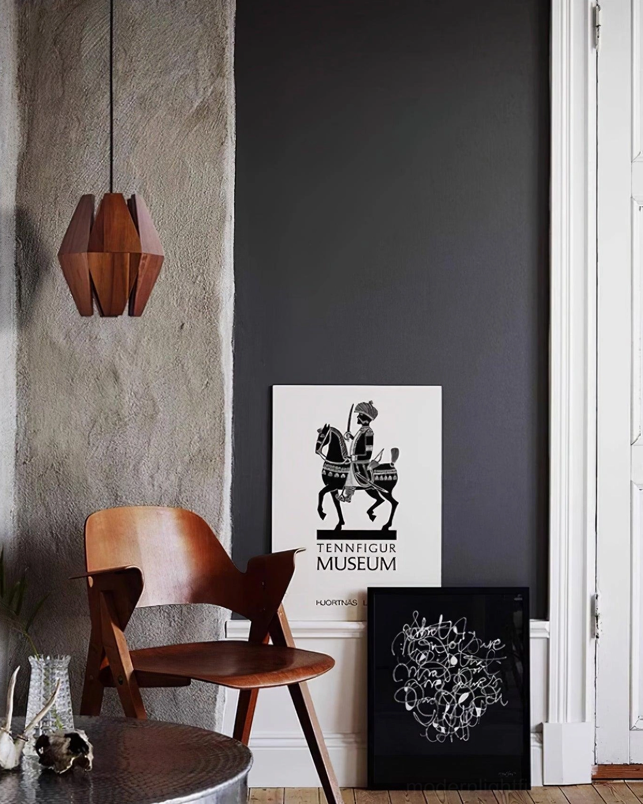 Faceted geometric pendant lamp showcasing walnut wood grain and artisanal craftsmanship