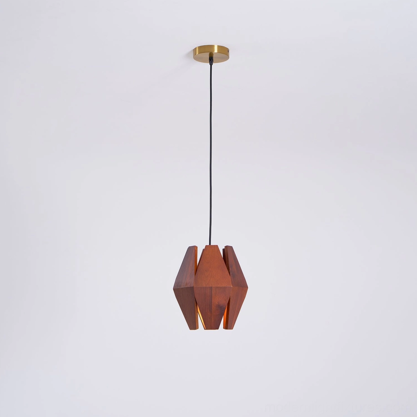 Faceted wood pendant light with polygonal design in contemporary home interior setting