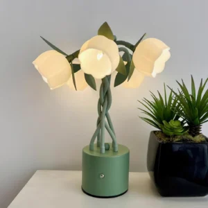 Faira tulip flower lamp on bedroom dresser with succulent plant, warm ambient lighting in cozy home setting, interior decor styling