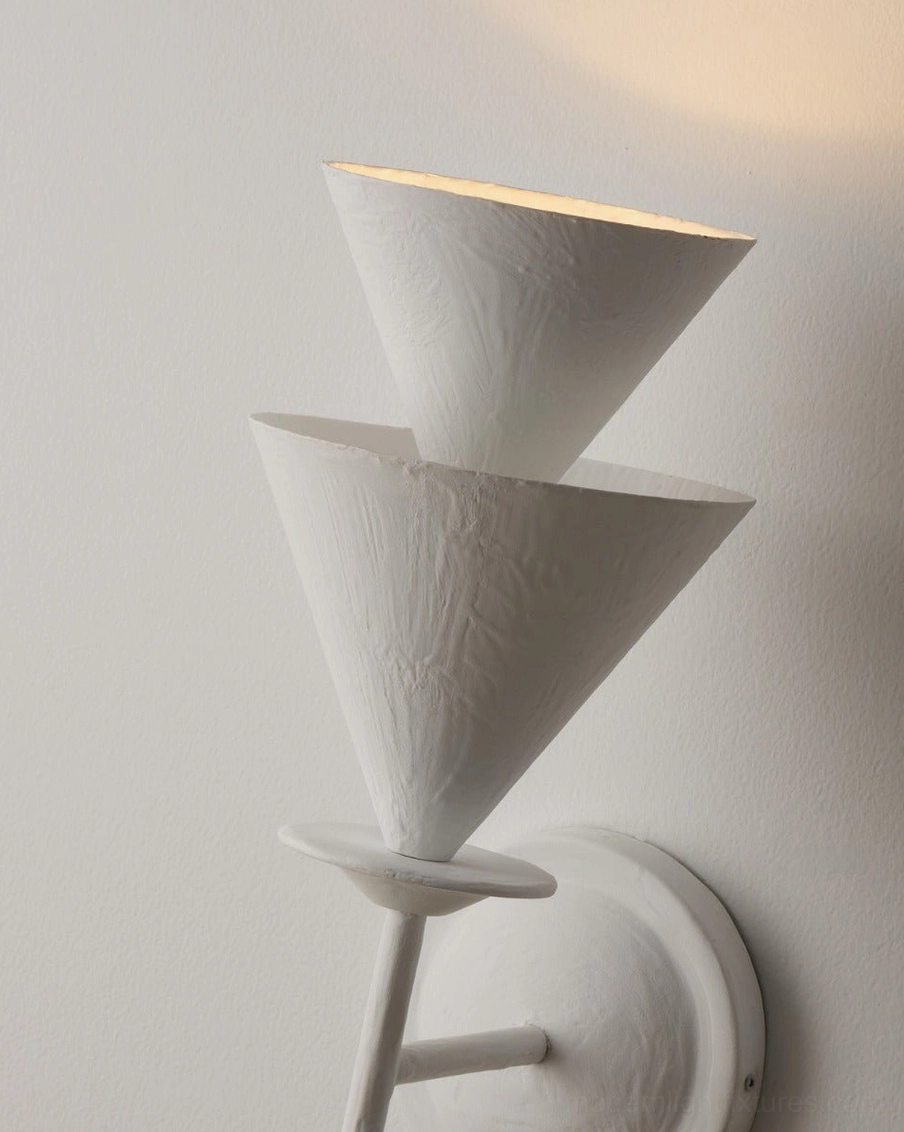 Fanoria contemporary wall sconce demonstrating upward light casting on wall, creating ambient vertical elegance