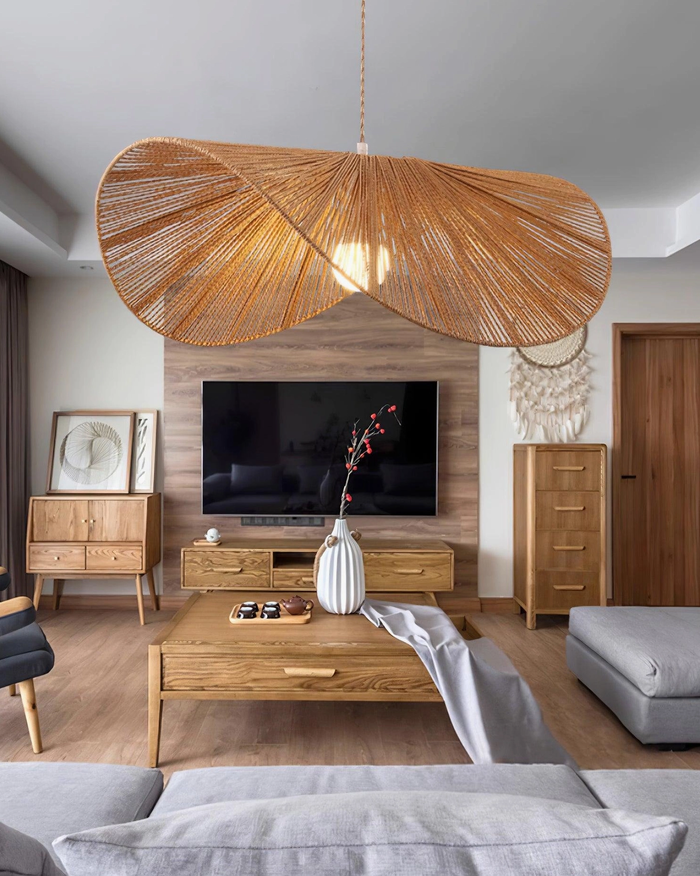 Natural woven hemp rope straw hat pendant fixture in farmhouse rustic interior with vintage accents
