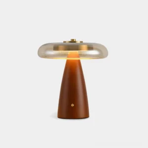 Fathom mid-century modern table lamp with tapered walnut wood base and cognac glass shade, front view studio