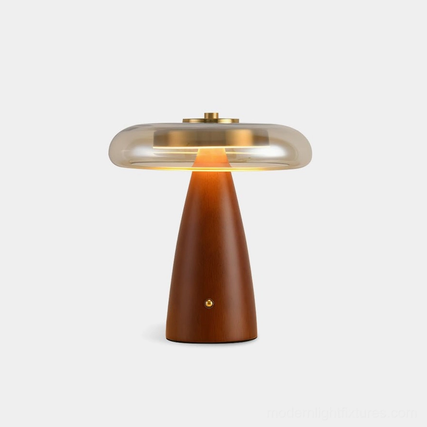 Fathom mid-century modern table lamp with tapered walnut wood base and cognac glass shade, front view studio