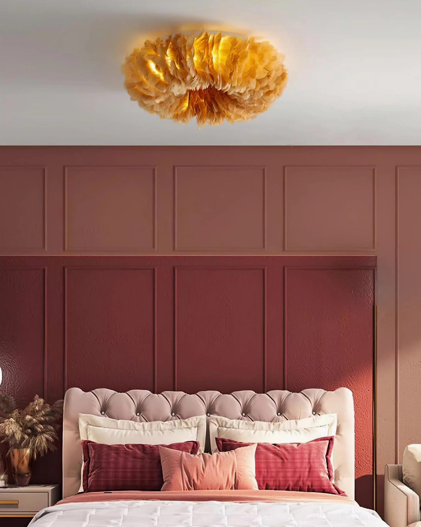 Wide overhead view of amber feather ceiling light fixture in classic bedroom with tufted headboard and warm lighting ambiance