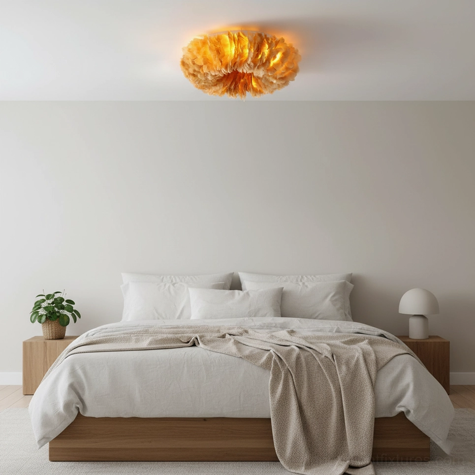 Warm amber feather ceiling light fixture in modern bedroom with wooden bed frame and cozy feather shape design overhead