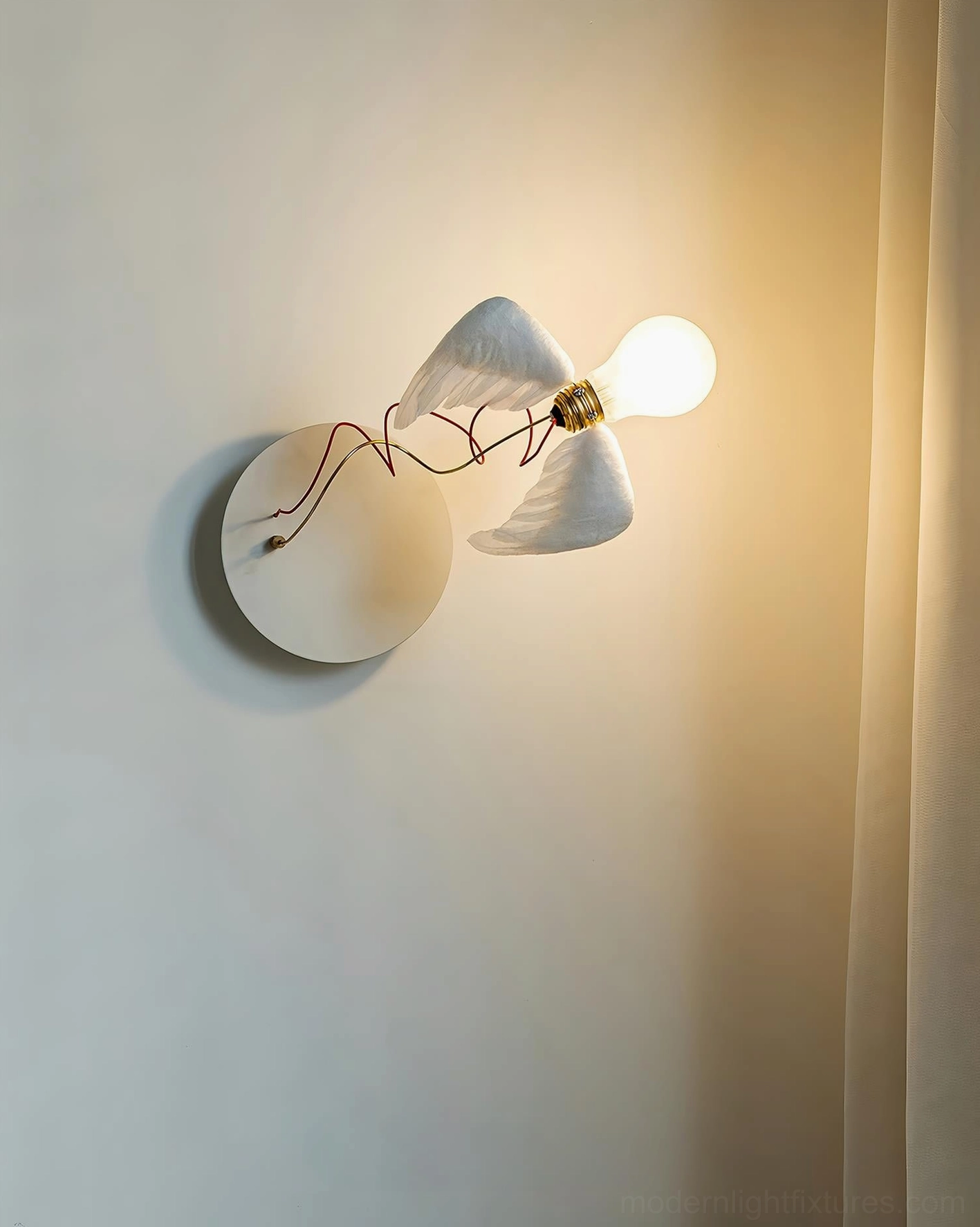 Feathered wing wall lamp providing accent lighting in contemporary home office creative workspace